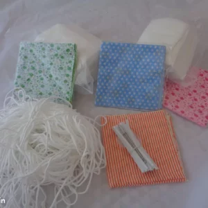 0882 –  élastiques ,filtres , tissus pour fabriquer 30 masques neufs .