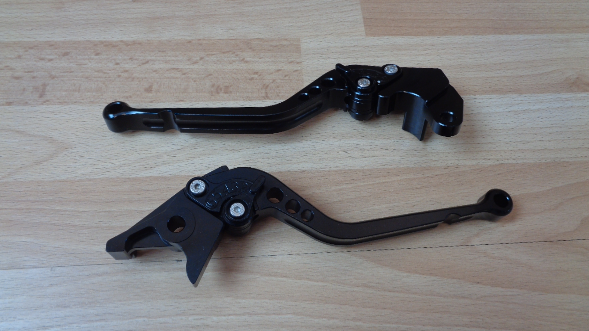 2233 – Levier d'embrayage et de frein noir pour moto réglable neufs – Image 10