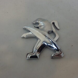 2403 – logo en métal lion pour peugeot neuf