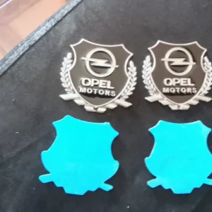 2653 – 2 Emblèmes Opel Motors métals neufs